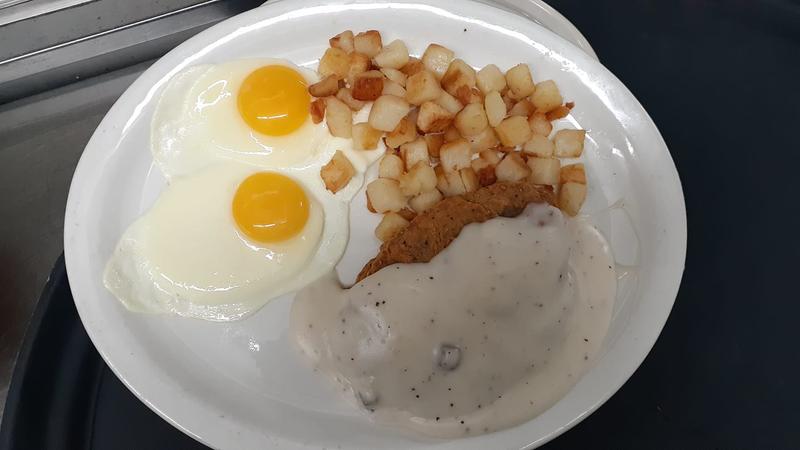 Eggs and hashbrowns with gravy